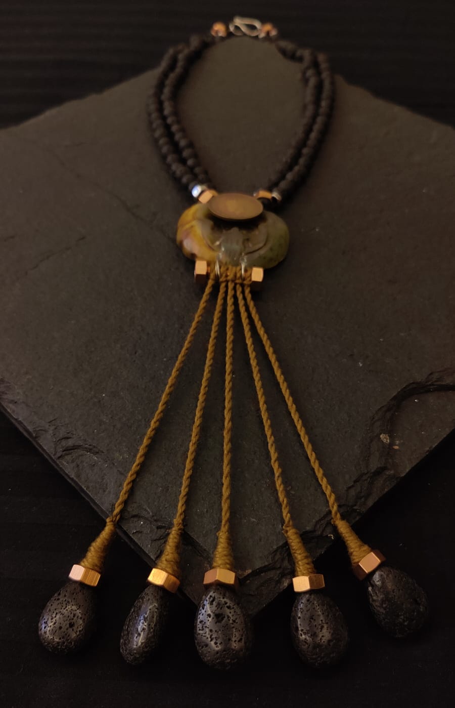 Carved stone necklace